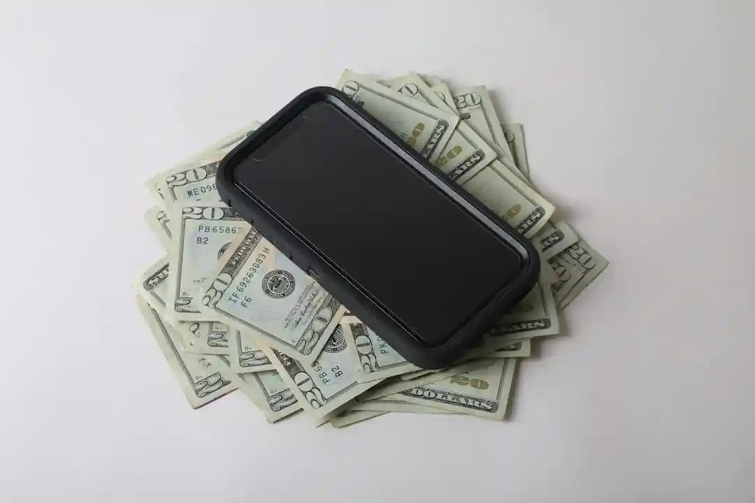 money and phone representing monetization opportunities - sponsored post opportunities money and phone representing monetization opportunities - sponsored post opportunities